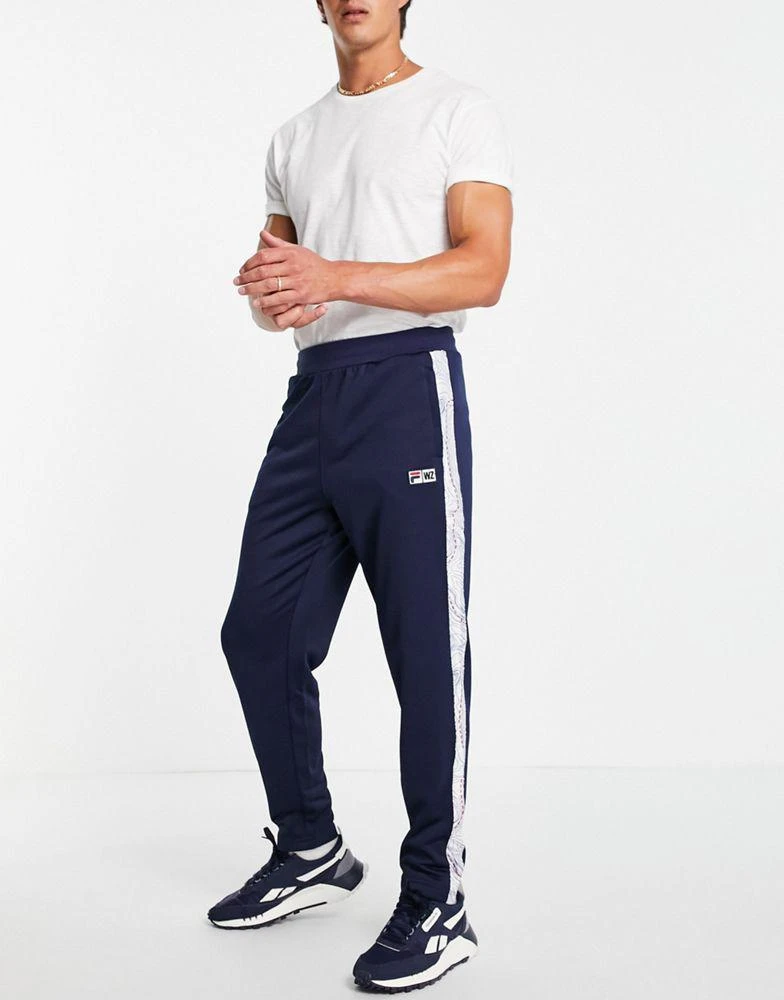 商品Fila|Fila x Call Of Duty Verdansk joggers in navy,价格¥380,第1张图片