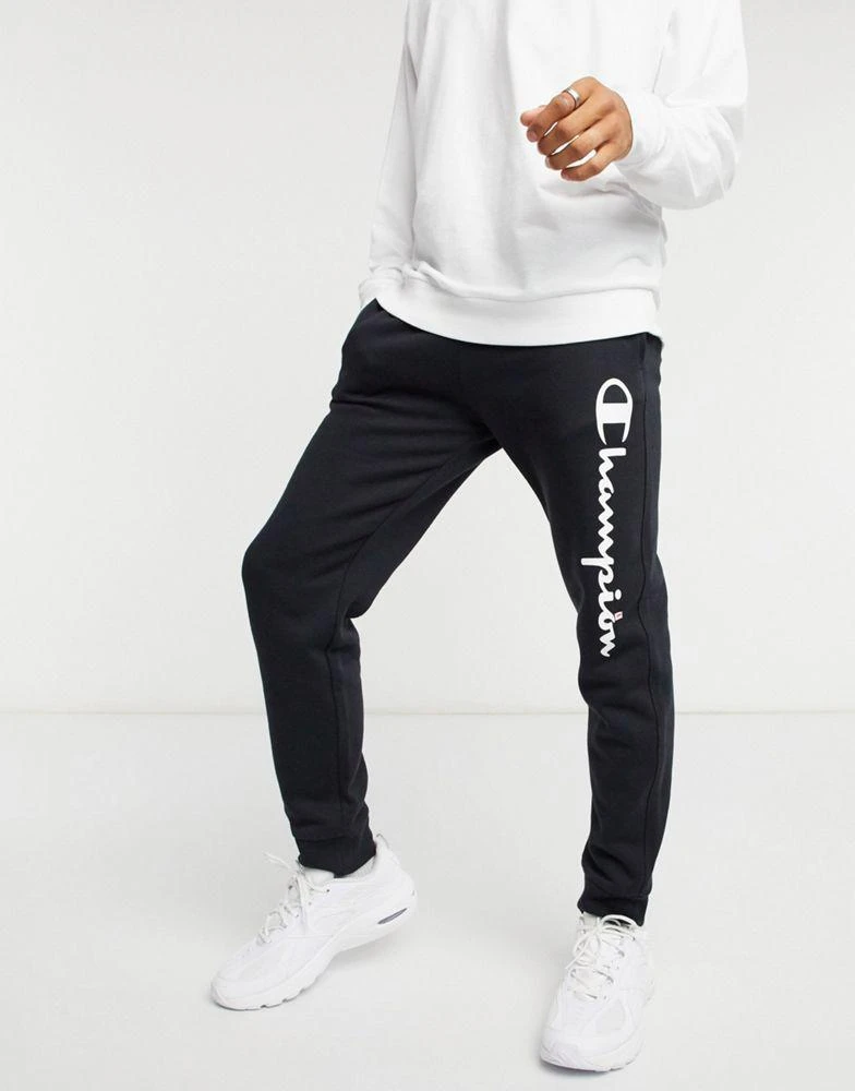 商品CHAMPION|Champion large logo tracksuit bottoms in black,价格¥354,第4张图片详细描述