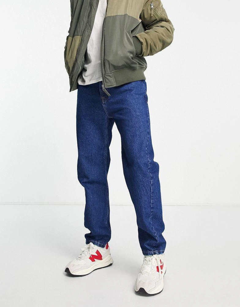 商品Topman|Topman curved leg tapered jeans in indigo,价格¥211,第4张图片详细描述