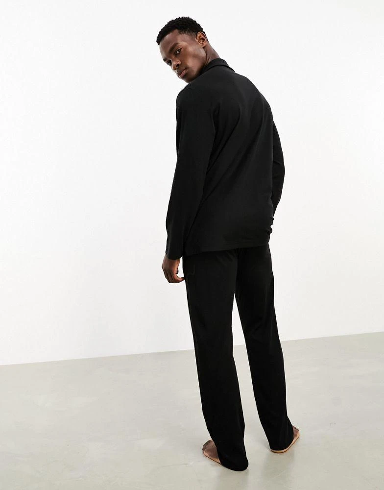 商品Calvin Klein|Calvin Klein CK Black button down sleep shirt and trouser pyjama set  in black,价格¥1265,第4张图片详细描述