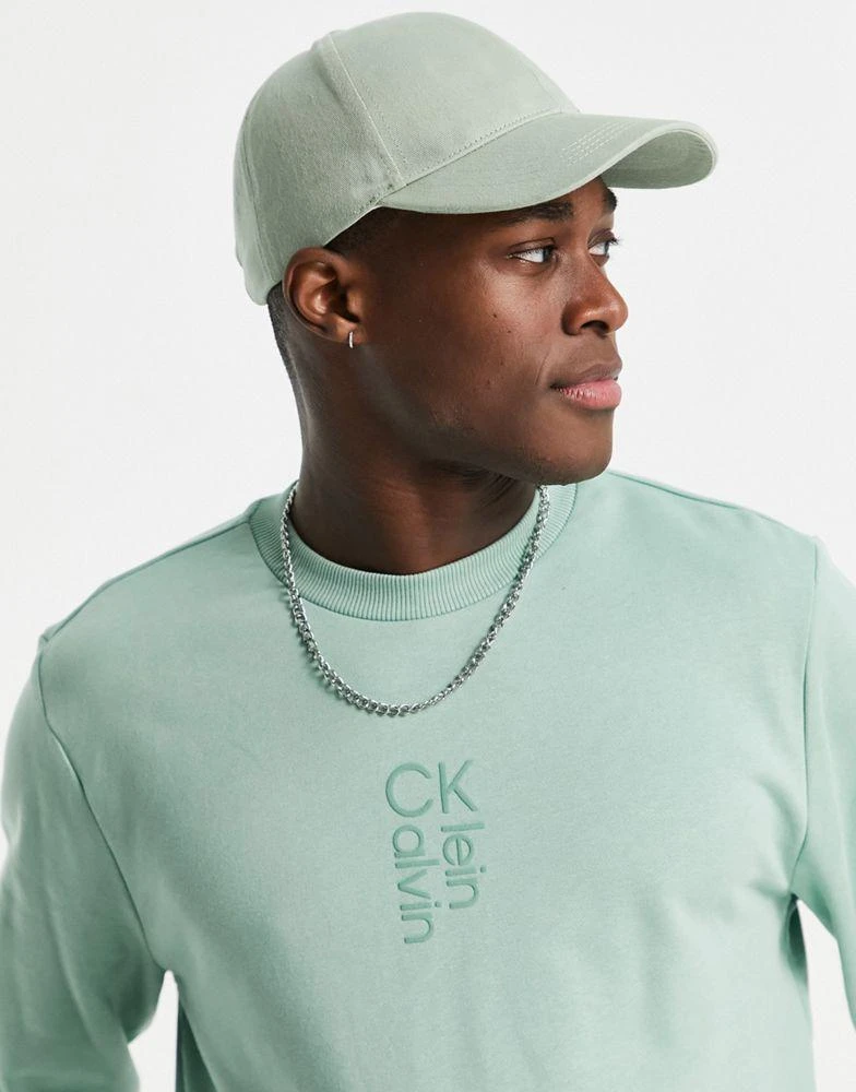 商品Calvin Klein|Calvin Klein hybrid logo sweatshirt in teal green,价格¥439,第4张图片详细描述