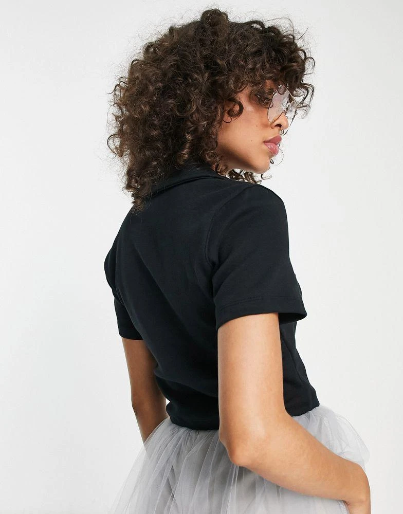 商品NIKE|Nike Essential mini swoosh short sleeve polo top in black,价格¥446,第2张图片详细描述