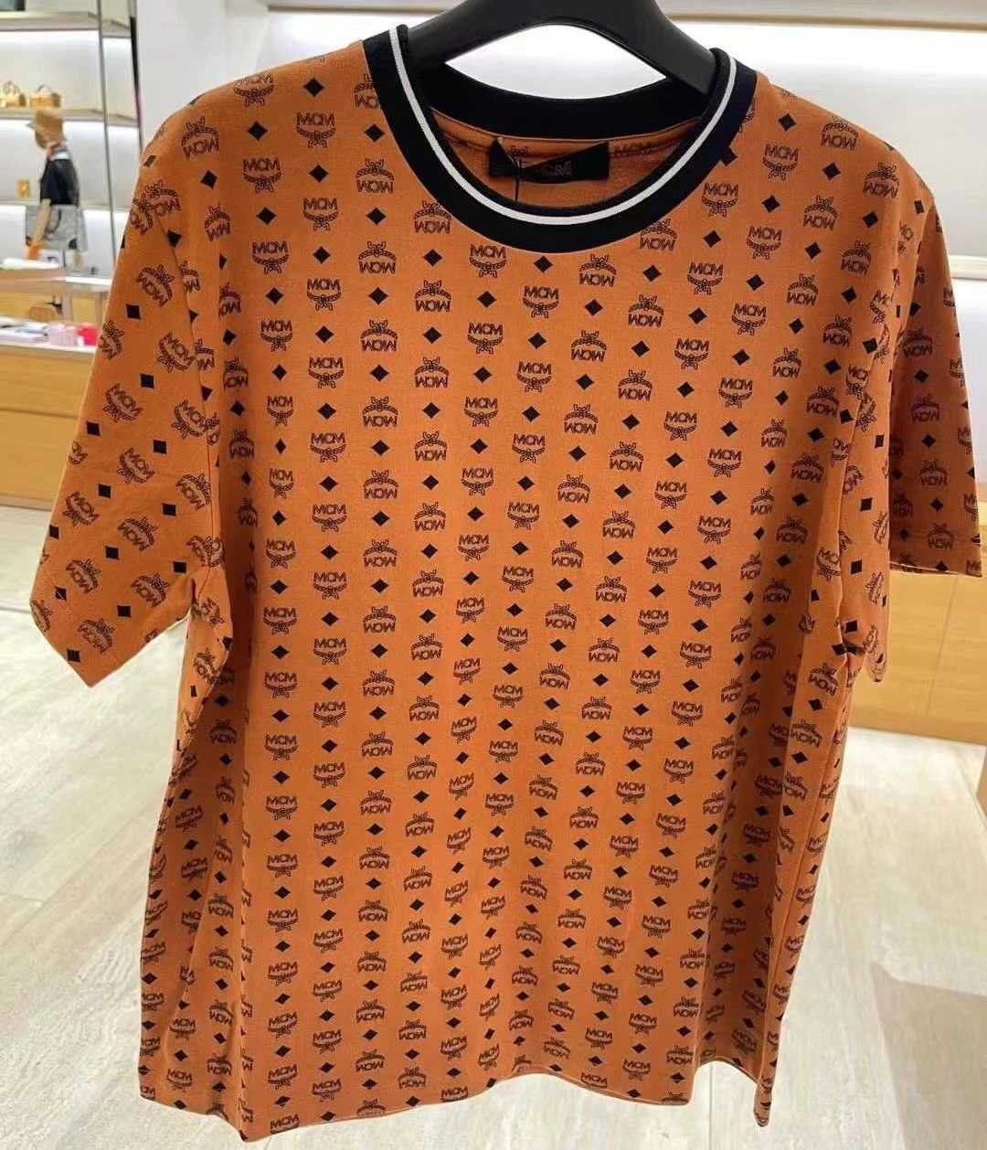 商品MCM| MCM Logo印花短袖T恤 女款 棕色MFTBAMM03CO000-COGNAC,价格¥2232,第1张图片