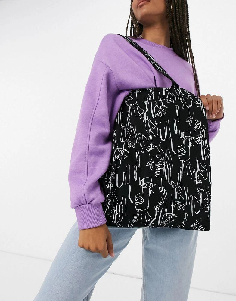 商品ASOS|ASOS DESIGN large cotton shopper bag in abstract face print,价格¥83,第4张图片详细描述