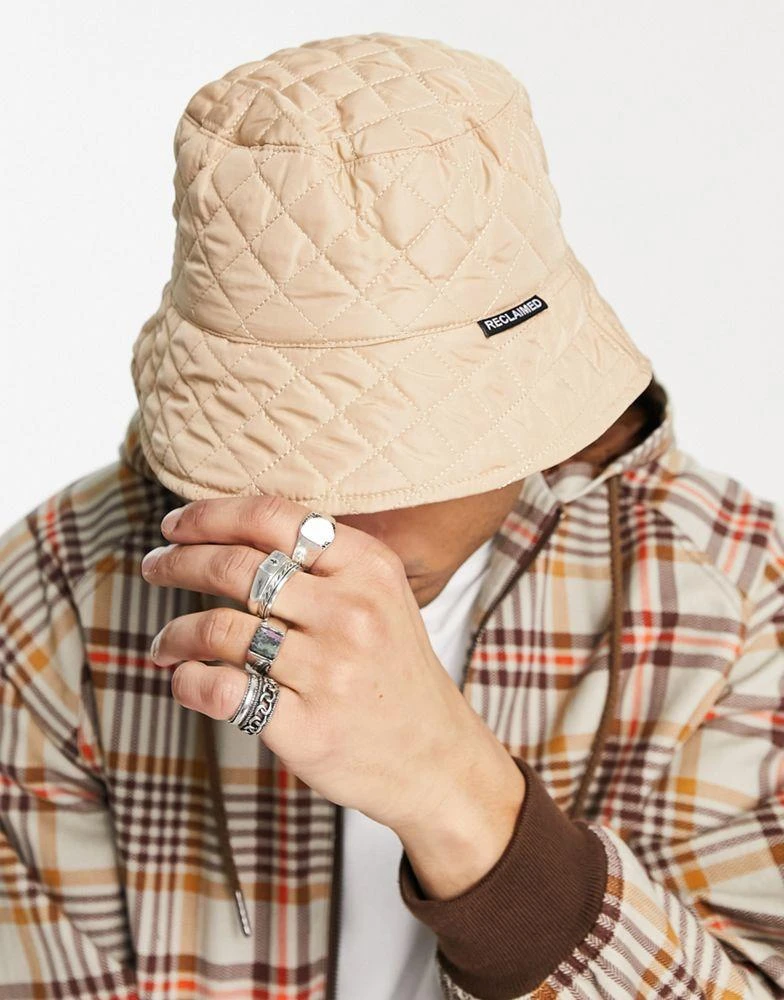 商品Reclaimed Vintage|Reclaimed Vintage unisex quilted bucket hat in stone nylon,价格¥62,第2张图片详细描述