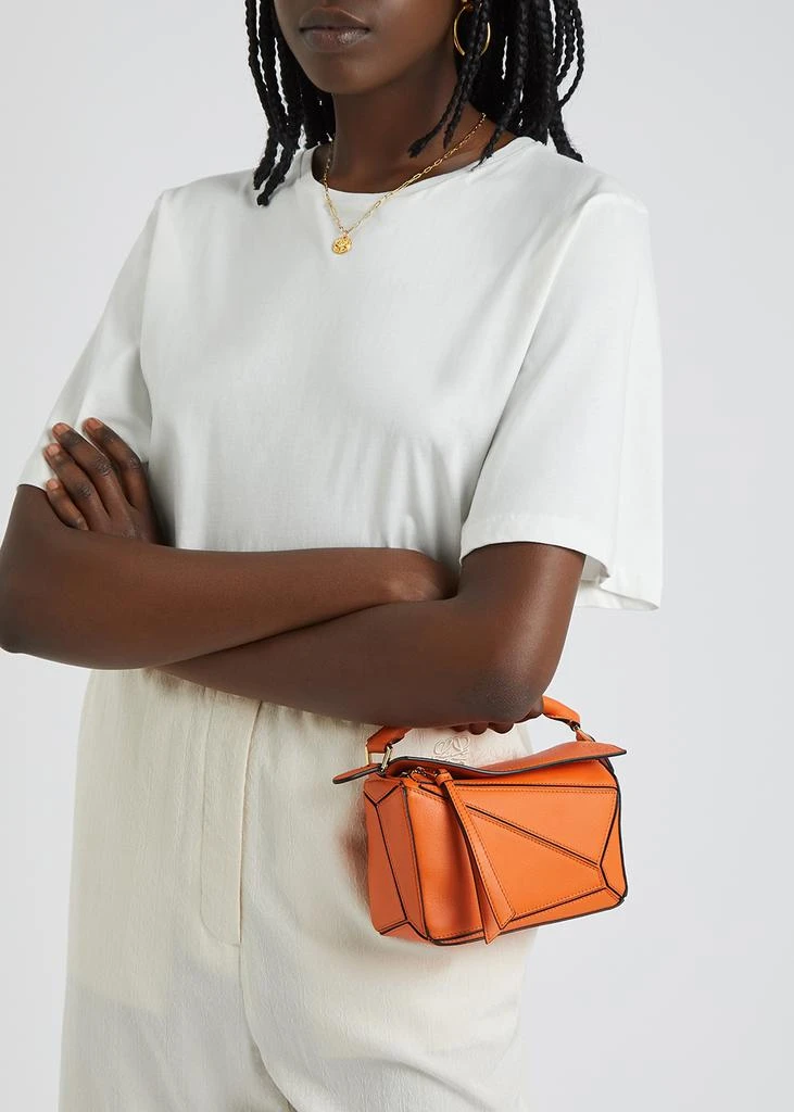 Puzzle mini orange leather cross-body bag 商品