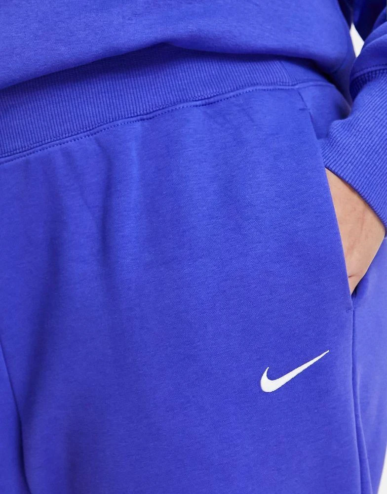 商品NIKE|Nike Plus mini swoosh curved high rise joggers in lapis blue,价格¥240,第4张图片详细描述