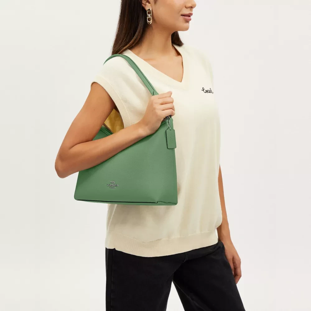 商品[国内直发] Coach|蔻驰 Laurel 31 徽标Logo拉链开合 鹅卵石皮革 手提斜挎单肩包 大号 女款 银色拼浅绿色,价格¥1769,第6张图片详细描述