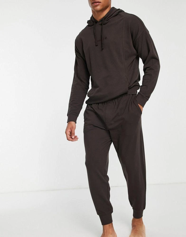 商品Calvin Klein|Calvin Klein contrast waistband lounge co-ord  joggers in brown,价格¥431,第1张图片