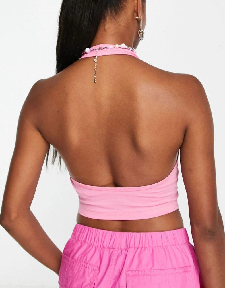 商品Echo Design|ASOS DESIGN Petite halter neck crop top in pink,价格¥73,第3张图片详细描述