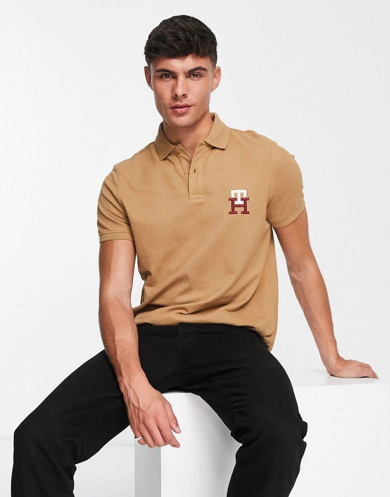 商品Tommy Hilfiger|Tommy Hilfiger monogram logo cotton blend pique polo in tan ,价格¥872,第1张图片