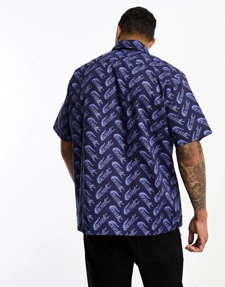 商品Lacoste|Lacoste relaxed fit all over logo short sleeve shirt in navy,价格¥623,第2张图片详细描述