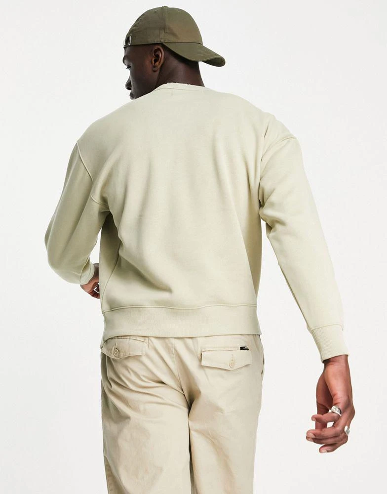 商品Calvin Klein|Calvin Klein Jeans high shine institutional logo sweatshirt in stone,价格¥450,第2张图片详细描述