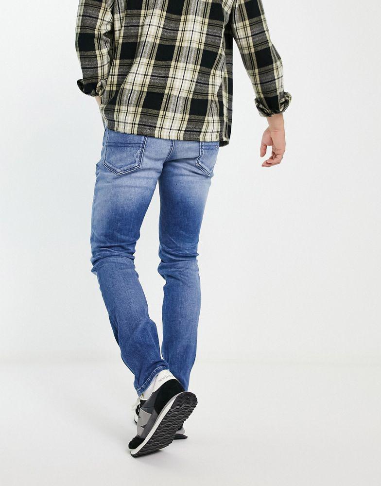 商品Tommy Jeans|Tommy Jeans simon skinny jean in mid wash,价格¥667,第5张图片详细描述