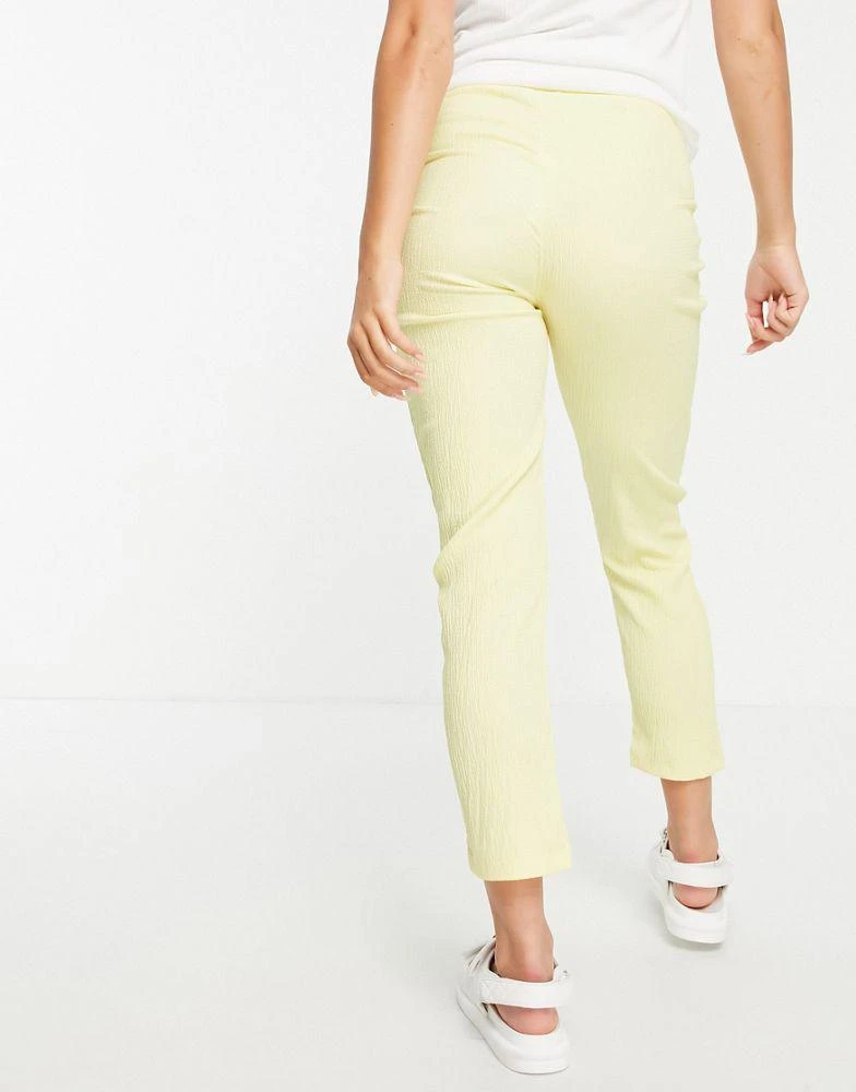 商品ASOS|ASOS DESIGN Maternity under the bump textured peg trouser with tie waist in lemon,价格¥64,第2张图片详细描述