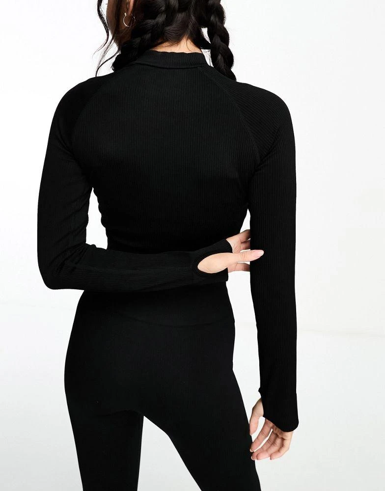 商品ASOS|ASOS 4505 Icon seamless rib 1/4 zip long sleeve top in black,价格¥196,第4张图片详细描述