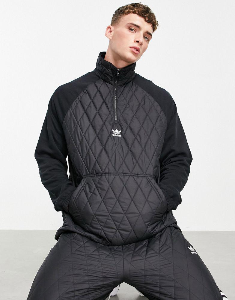 商品 adidas Originals adicolor quilted 1/4 zip jacket in black 图