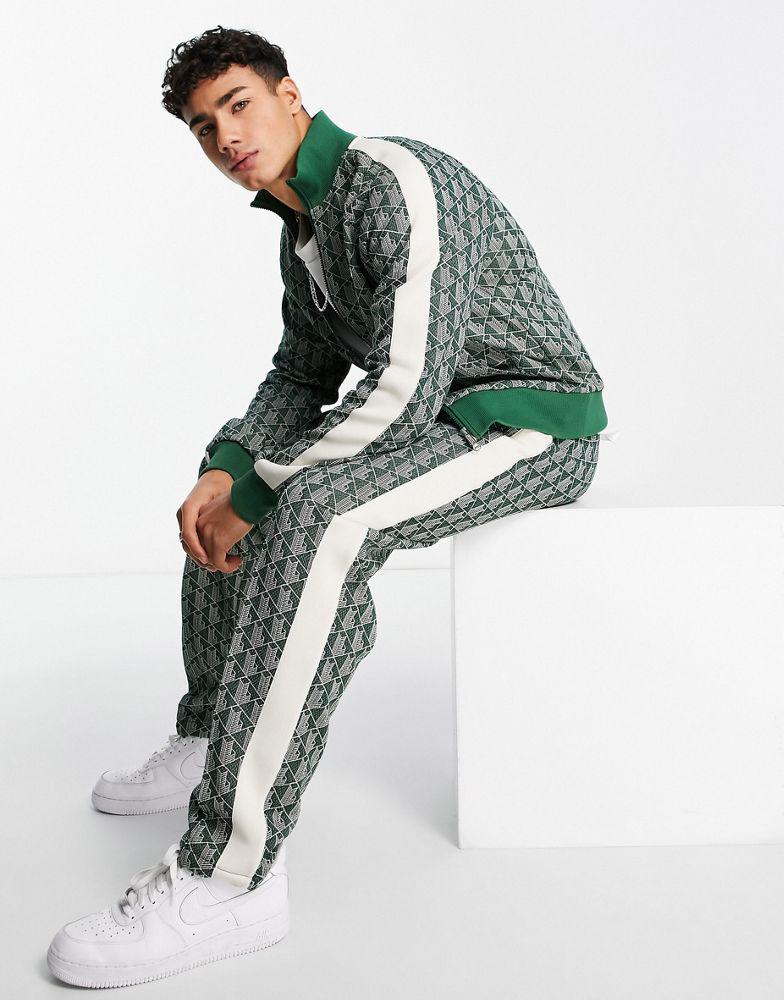 Lacoste all over print taped track bottoms in green商品第1张图片规格展示