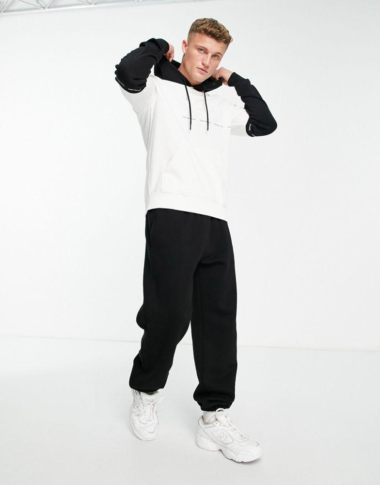 商品Calvin Klein|Calvin Klein Jeans colourblock hoodie in white & black,价格¥644,第6张图片详细描述