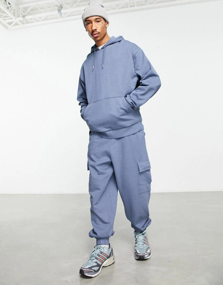 商品ASOS|ASOS DESIGN oversized hoodie and oversized joggers with cargo pocket tracksuit in blue,价格¥257,第1张图片