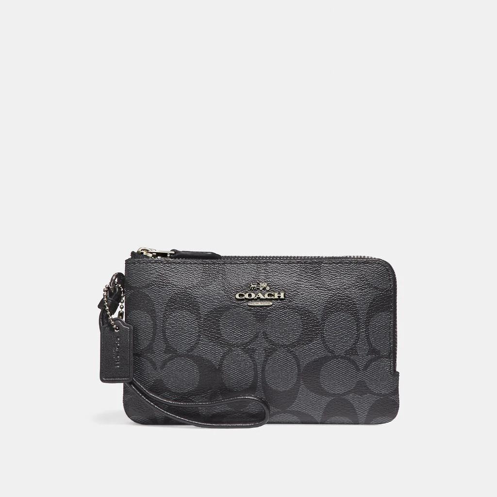 商品Coach|蔻驰经典帆布手拿包,价格¥218,第1张图片