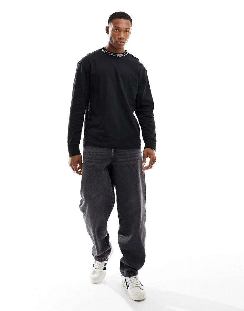商品Calvin Klein|Calvin Klein unisex running logo long sleeve t-shirt in black,价格¥483,第3张图片详细描述