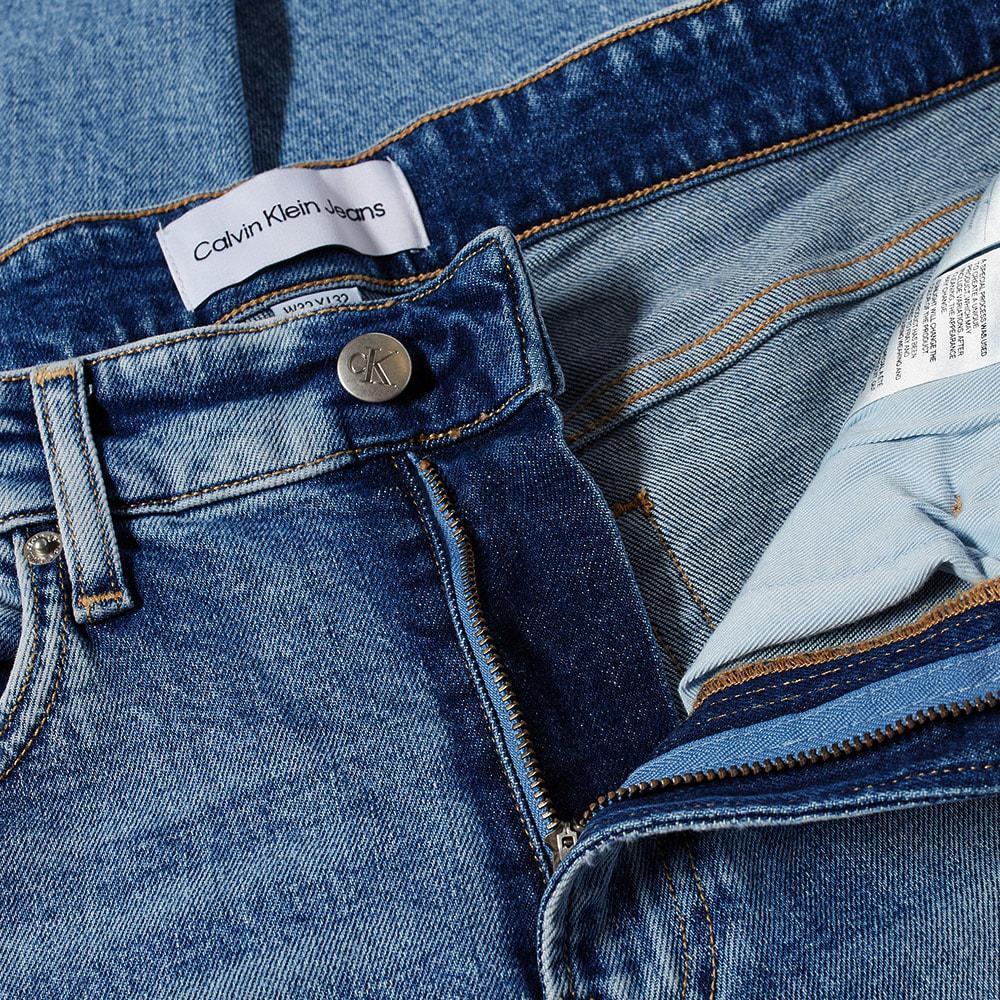 商品Calvin Klein|Calvin Klein Slim Taper Light Wash Distressed Jean,价格¥514,第4张图片详细描述