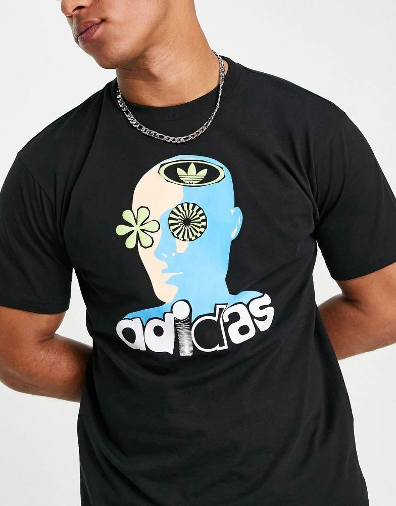 商品Adidas|adidas Originals SPRT US airplay head graphic t-shirt in black,价格¥154,第1张图片