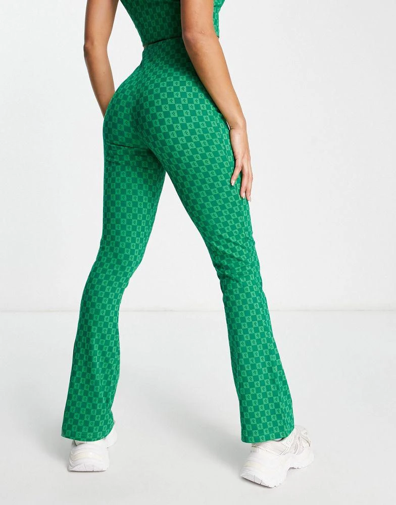 商品Fila|Fila retro flare trousers in green,价格¥233,第2张图片详细描述