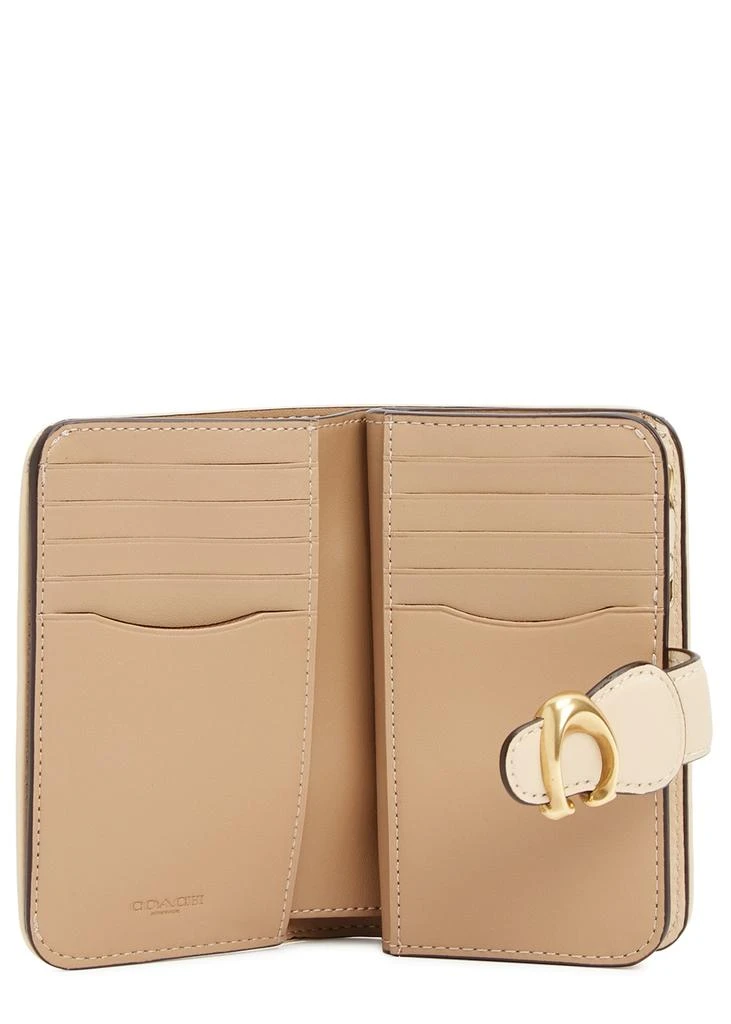 商品Coach|Tabby medium cream monogrammed wallet,价格¥1221,第4张图片详细描述