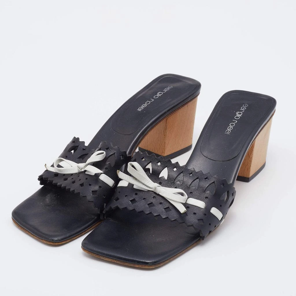 商品[二手商品] Sergio Rossi|Sergio Rossi Black/White Laser Cut Leather Bow Detail Slide Sandals Size 37.5,价格¥885,第2张图片详细描述