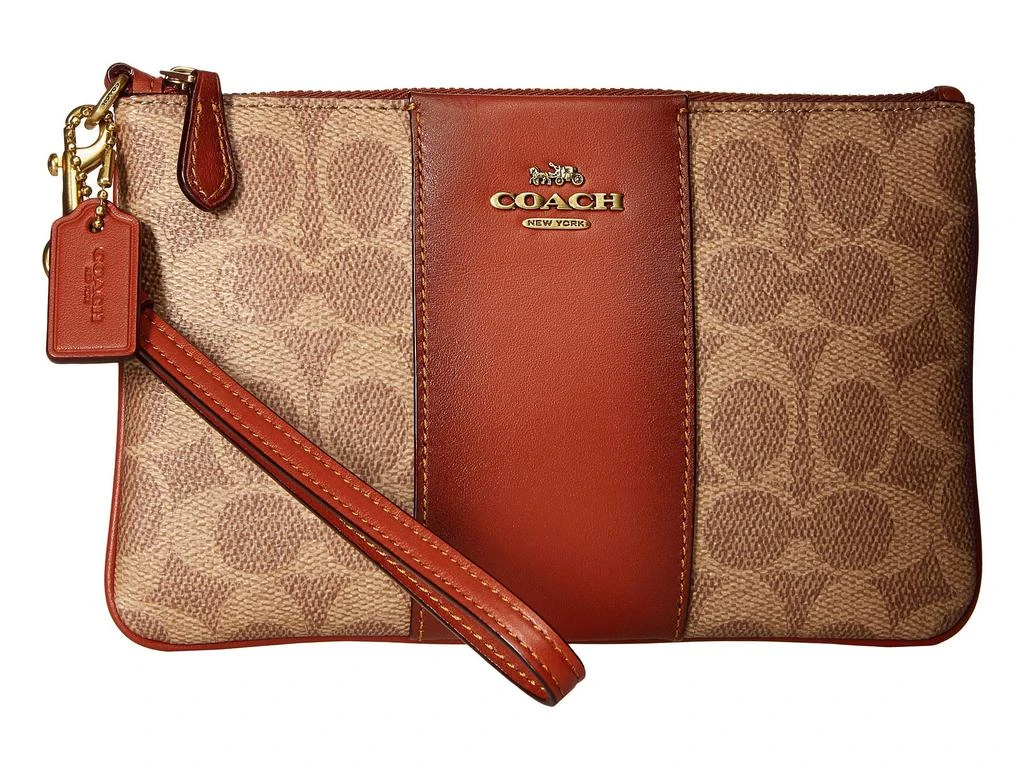 商品Coach|小号老花帆布腕包,价格¥711,第1张图片