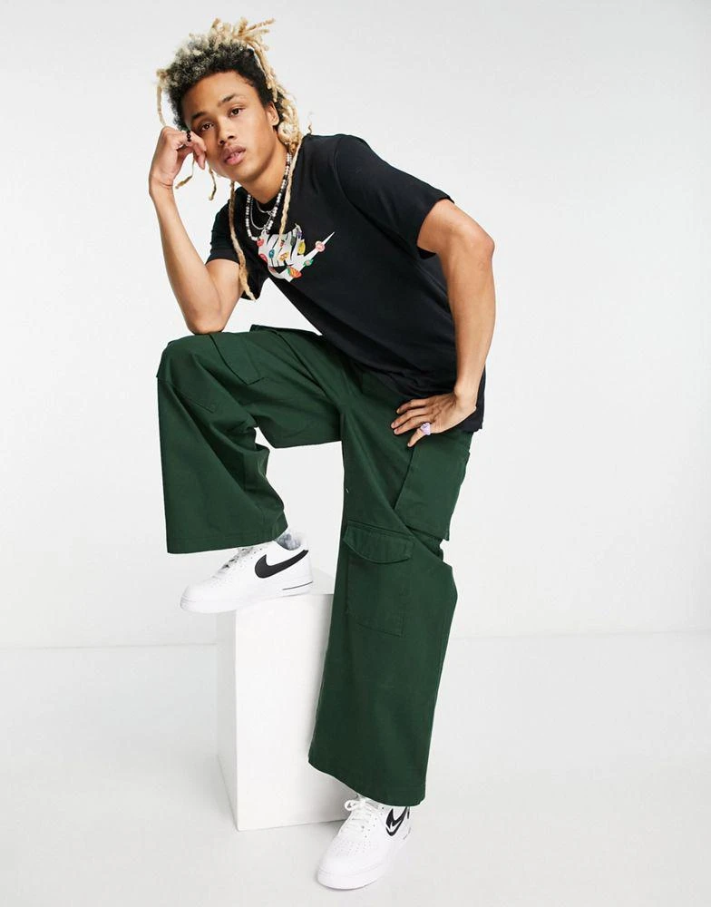 商品NIKE|Nike 'Certified Fresh' fruit sticker chest print t-shirt in black,价格¥129,第2张图片详细描述