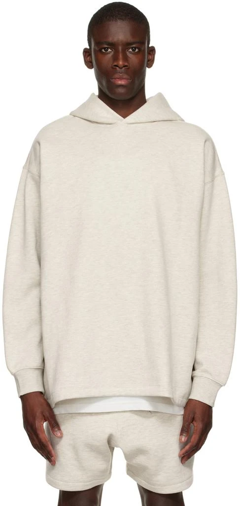 Fear of God ESSENTIALS Off-White Relaxed Hoodie 1