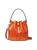 color SPRING SPICE, Tory Burch | T Monogram Embossed Patent Leather Bucket Bag