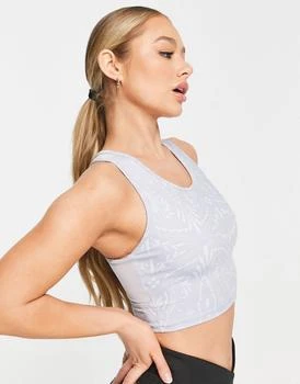 Puma | Puma Yoga Studio crop top in blue print,商家ASOS,价格¥114