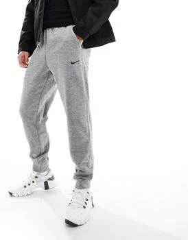 推荐Nike Training Dri-FIT tapered joggers in grey商品
