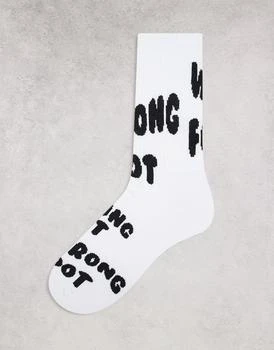 ASOS | ASOS DESIGN sports sock with wrong foot slogan 