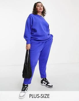 NIKE | Nike Plus mini swoosh curved high rise joggers in lapis blue,商家ASOS,价格¥242