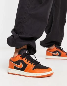 Jordan | Jordan AJ1 Low trainers in orange and black,商家ASOS,价格¥799