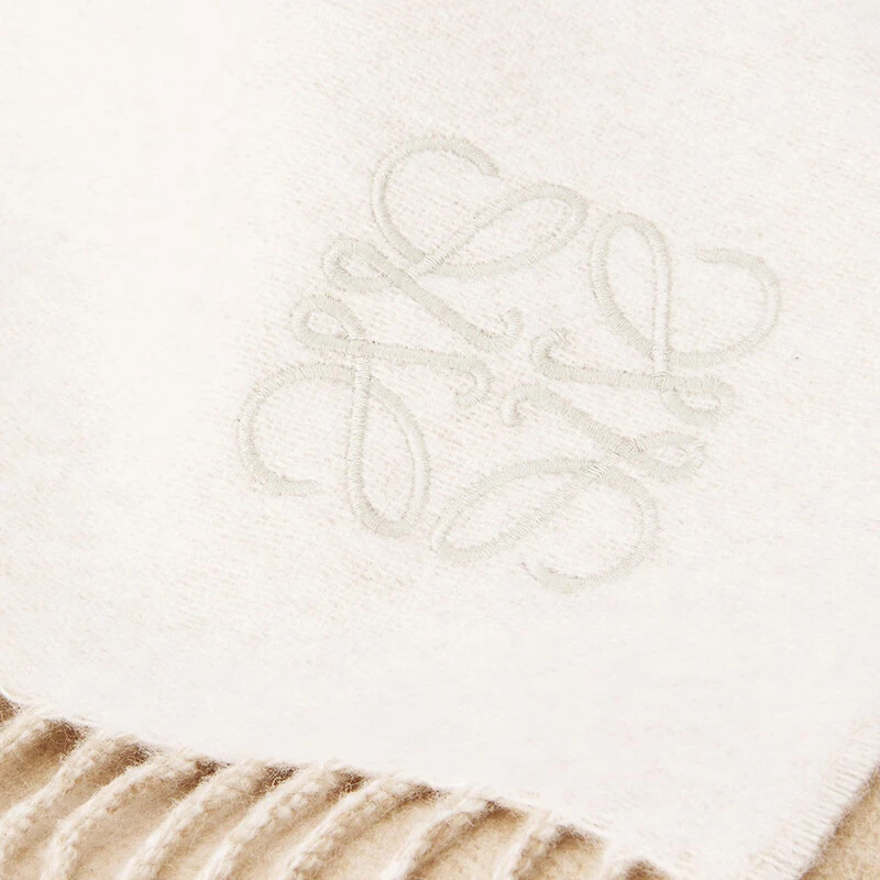 推荐LOEWE/罗意威 女士羊绒羊毛混纺双面对比色末端流苏围巾 米色/白色商品