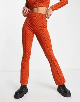 推荐Fila retro flare trousers in orange商品