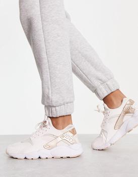Nike Air Huarache trainers in soft pink and metallic shimmer,价格$146.62